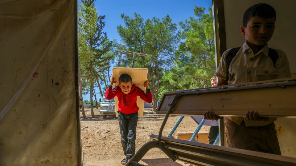 Suriye'de savaşın izleri arasında yeni eğitim-öğretim yılı başladı